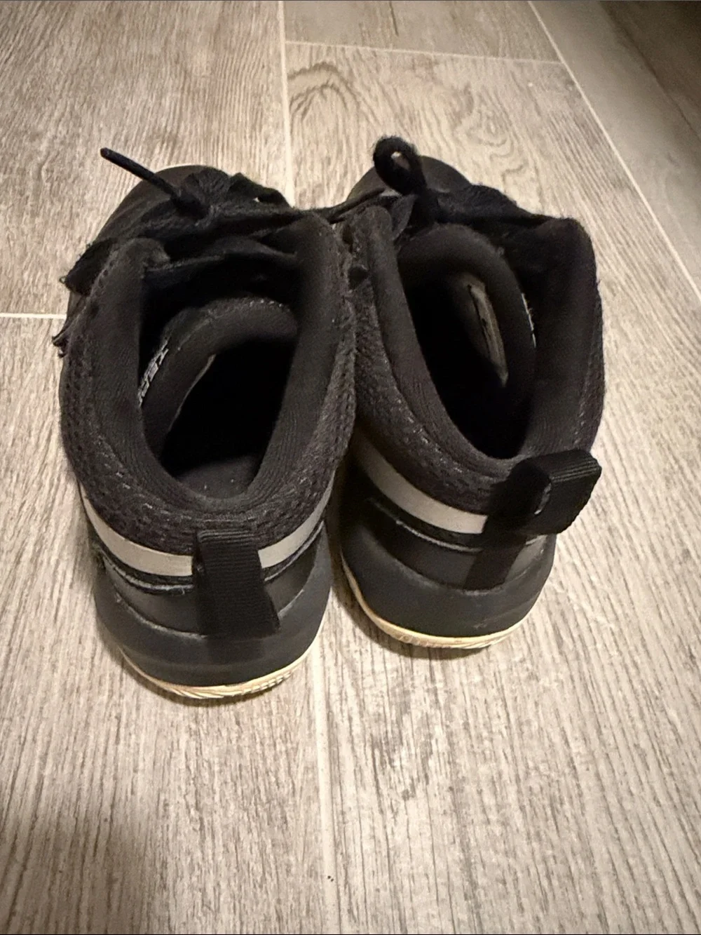 Nike Kids Black Sneakers with White Swoosh